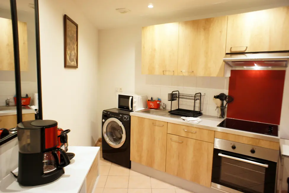 Cuisine équipée avec lave linge